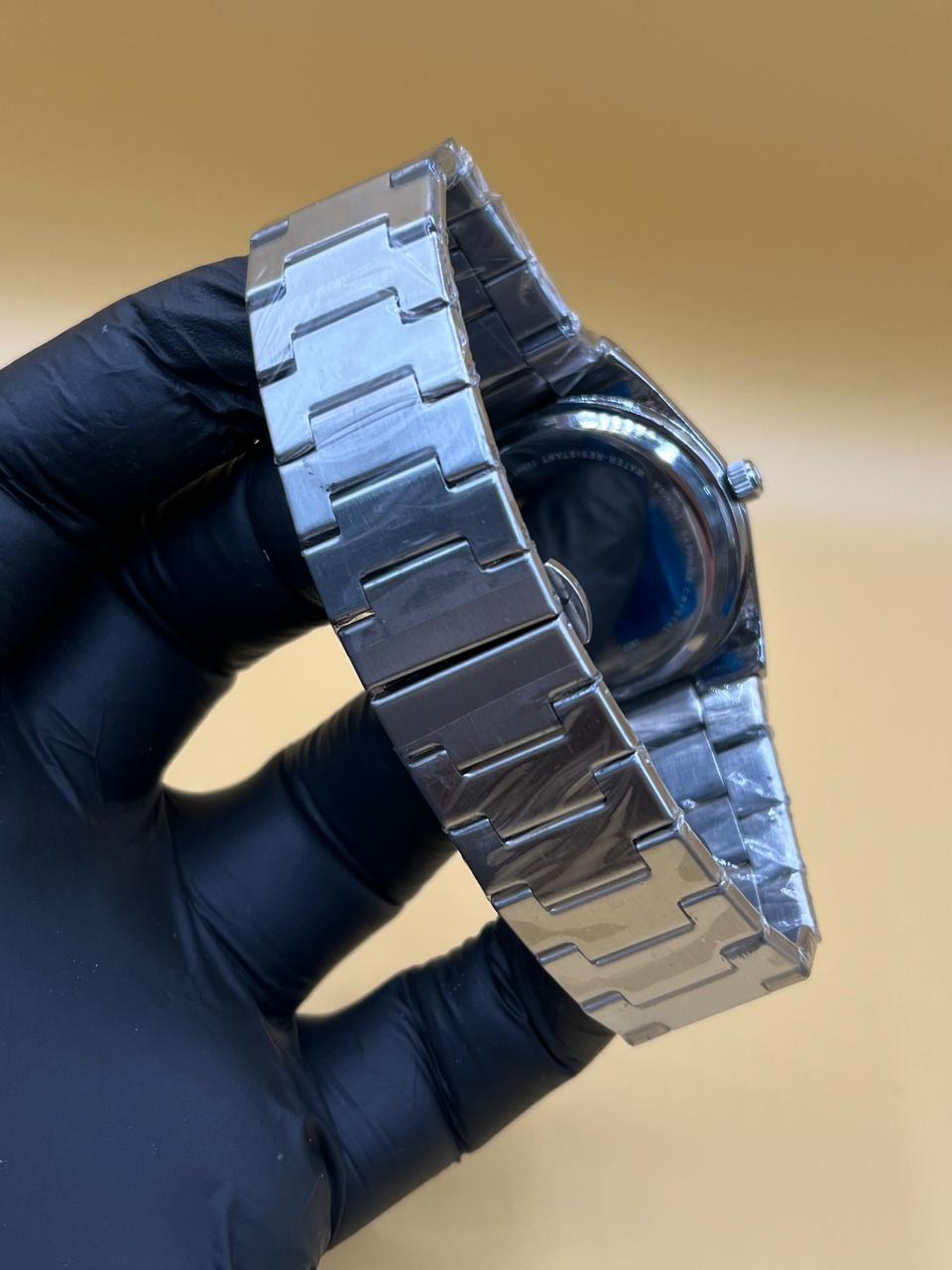 Men watch tissot Manuel